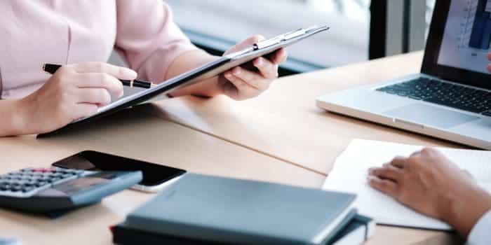 Woman using AML compliance software solution